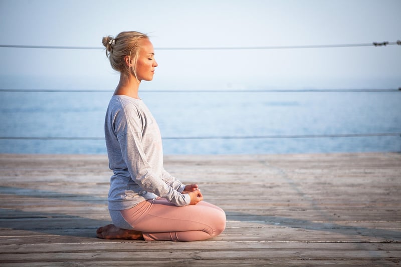 Woman practicing somatic movement